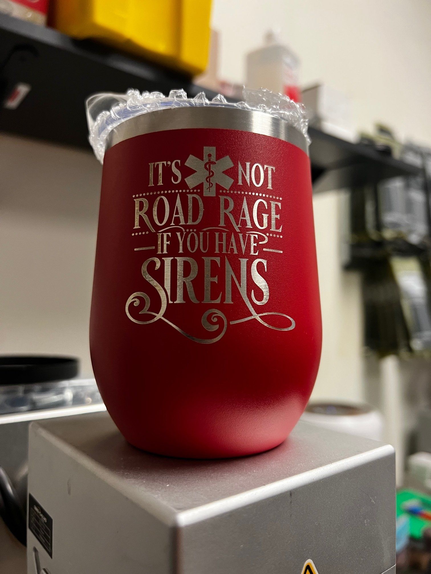 A red wine tumbler that says `` it 's not road rage if you have sirens ''.