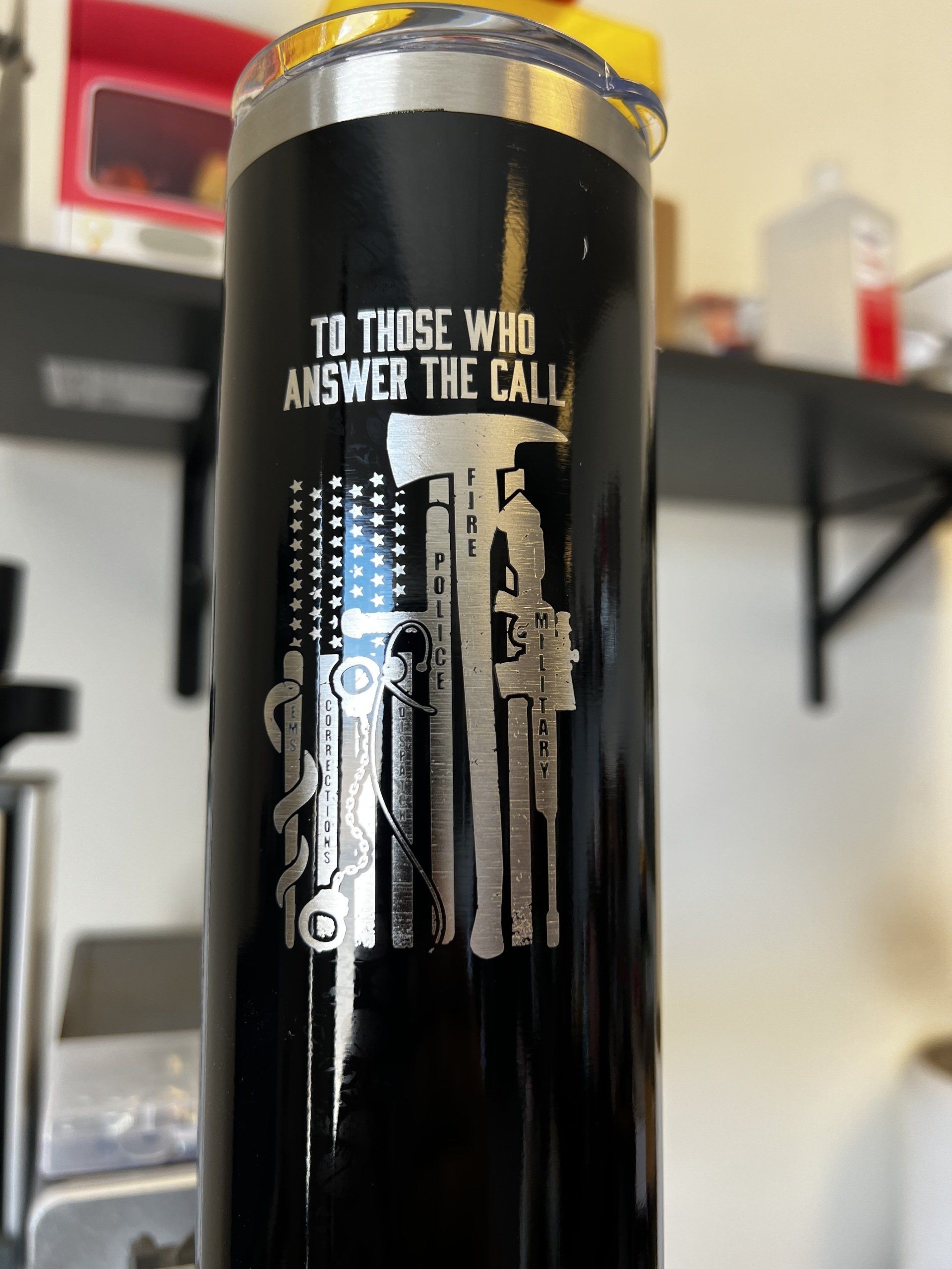 A black tumbler with the words `` to those who answer the call '' on it