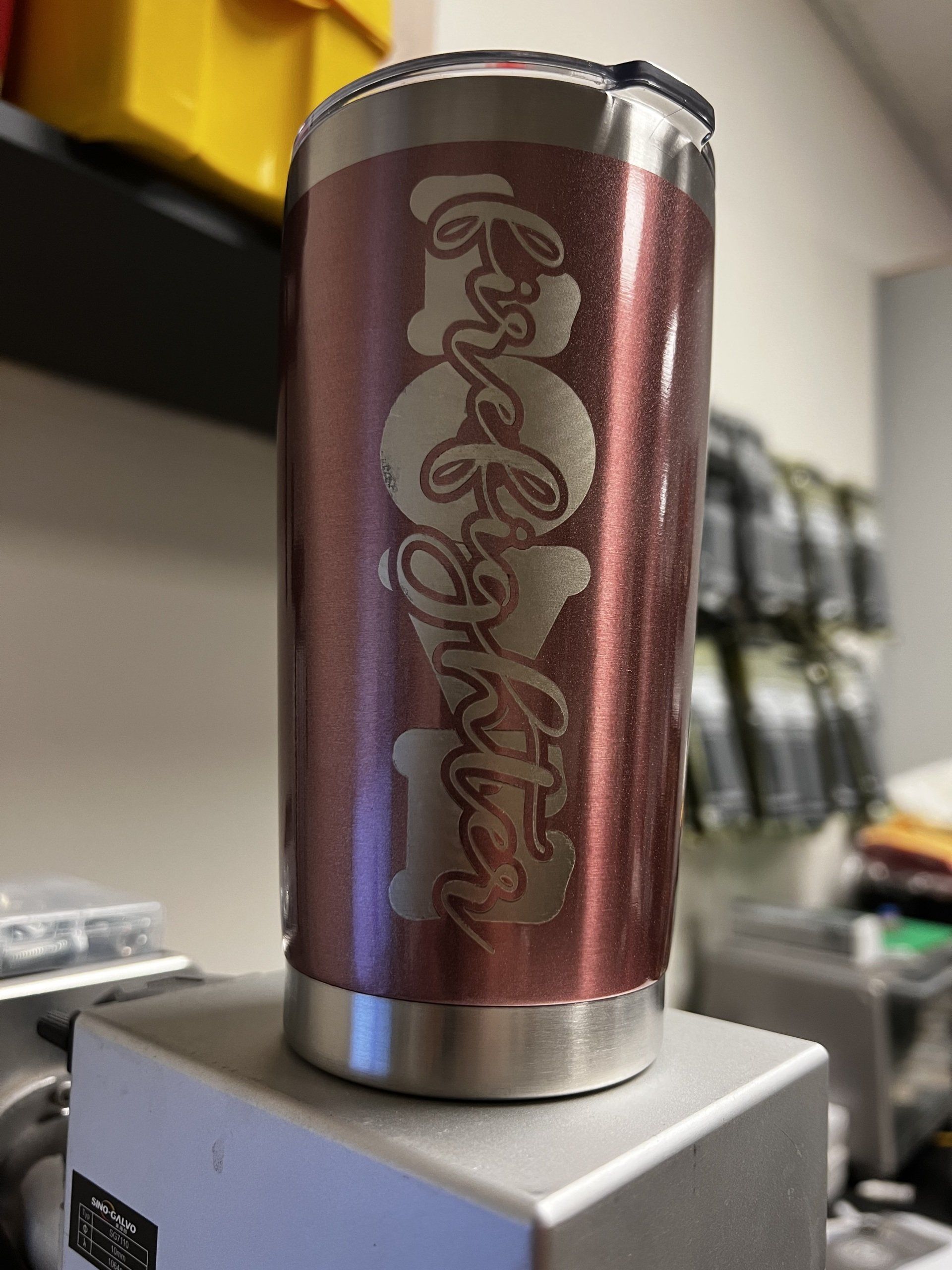 A stainless steel tumbler with the word kindergarten engraved on it