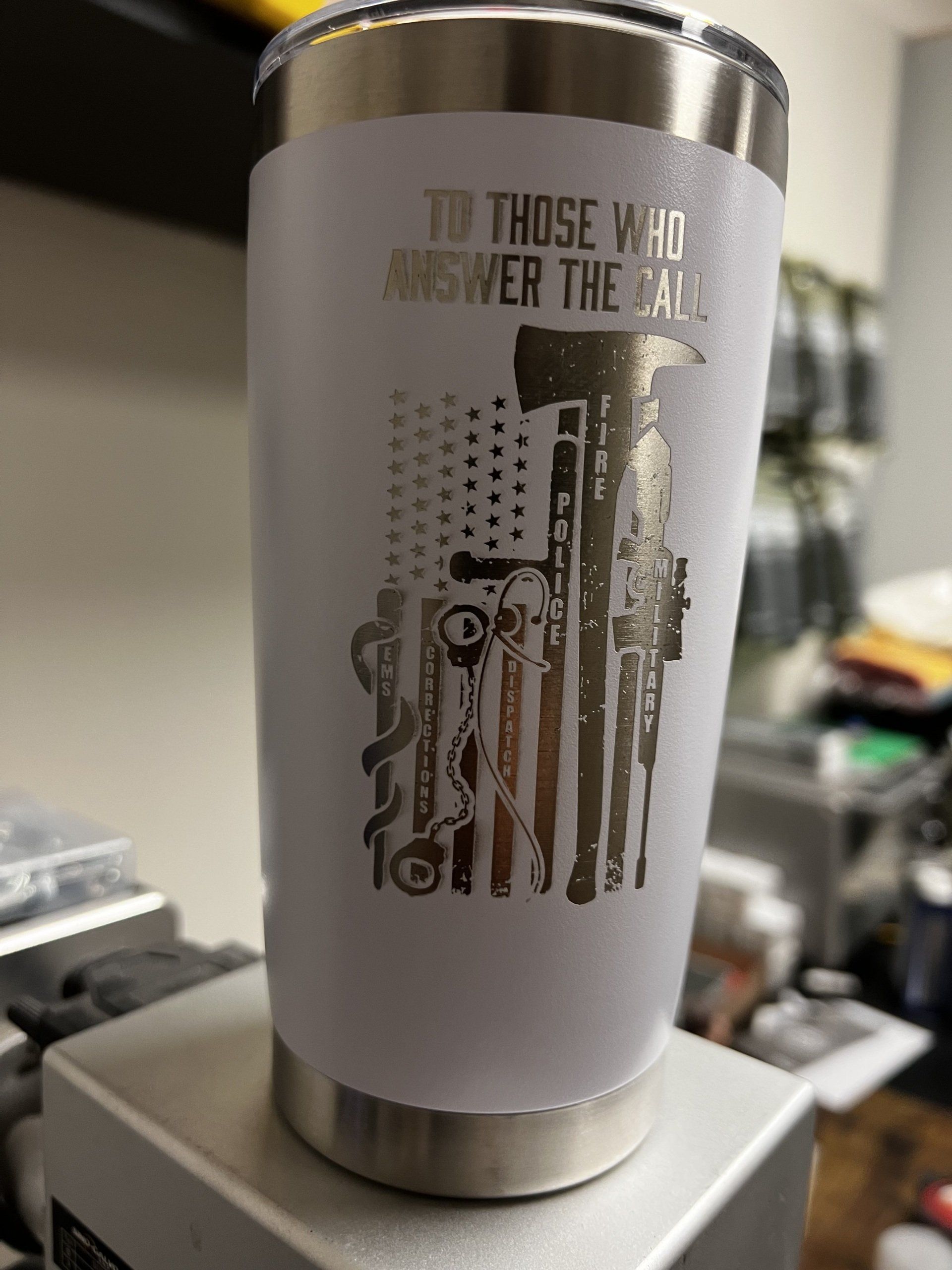A stainless steel tumbler that says `` to those who answer the call ''
