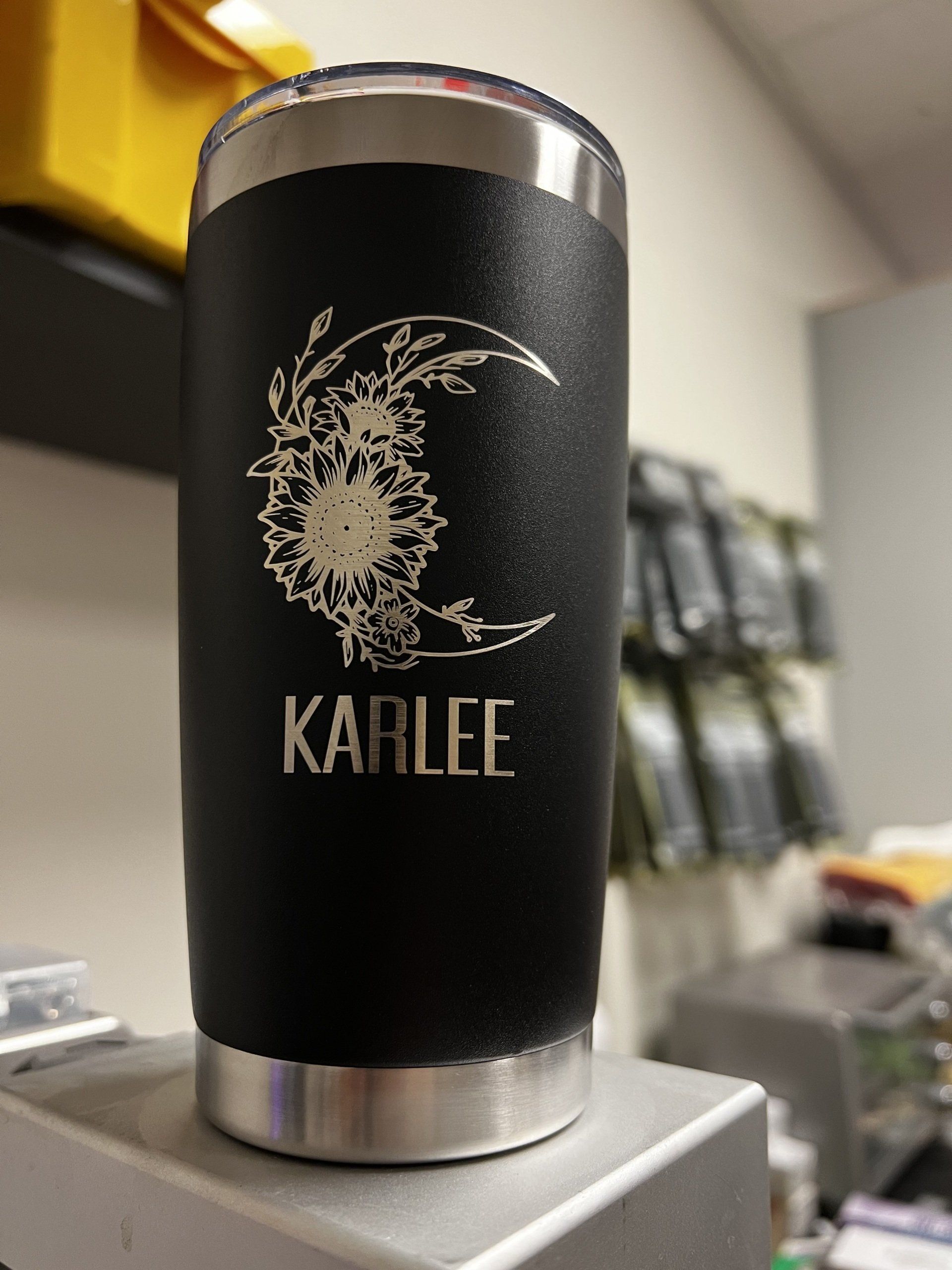 A black tumbler with the name karlee on it