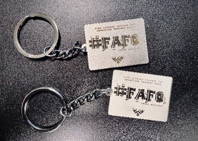 Two keychains with the word fafs on them