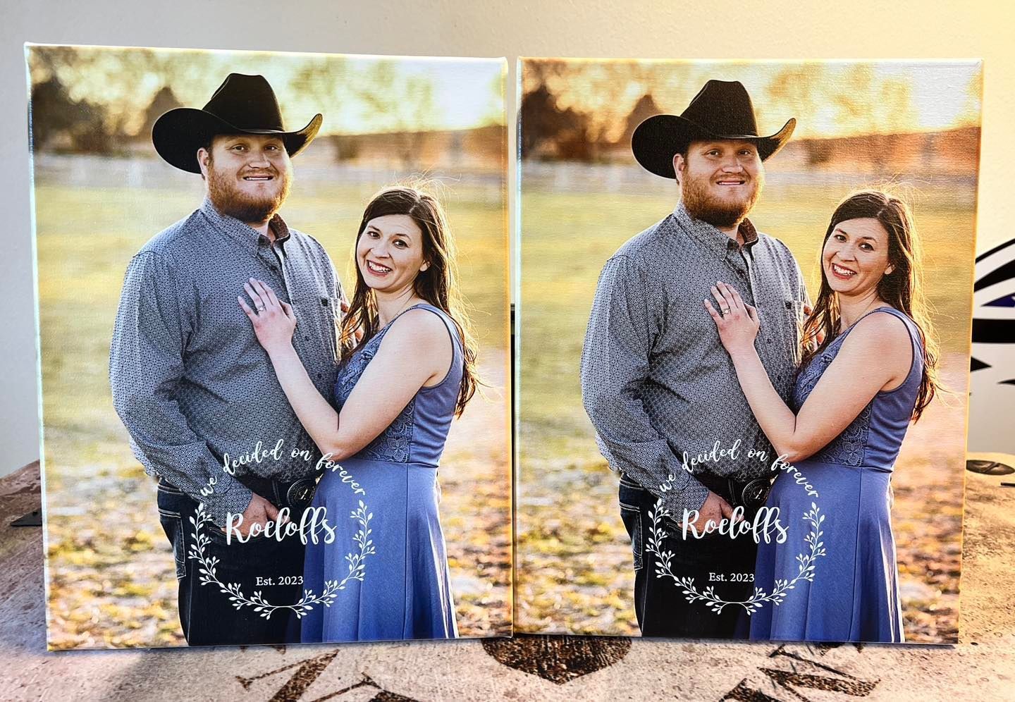A man and a woman are standing next to each other in a field.