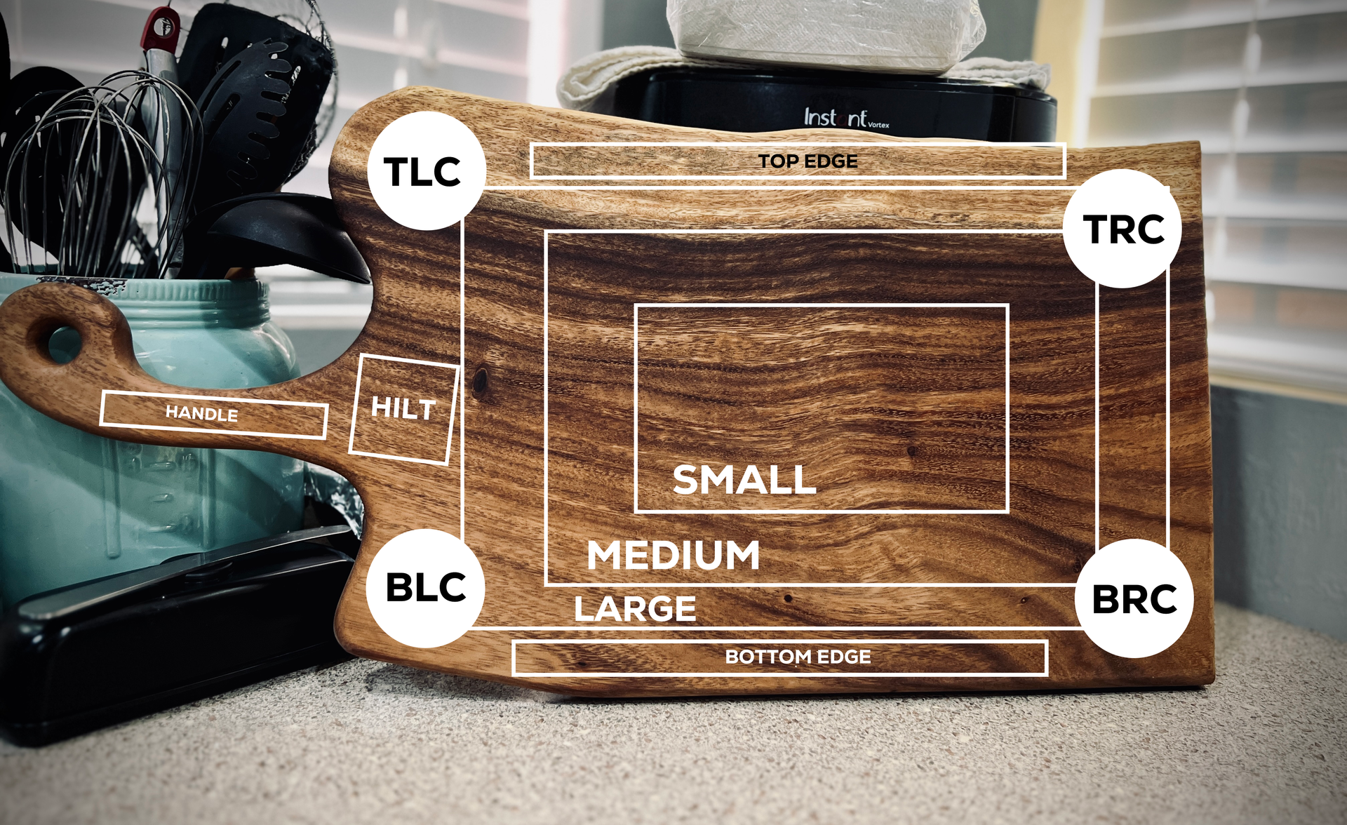 A wooden cutting board with labels on it is sitting on a counter.