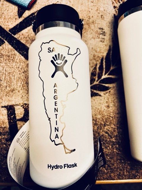 A white hydro flask with a map of argentina on it