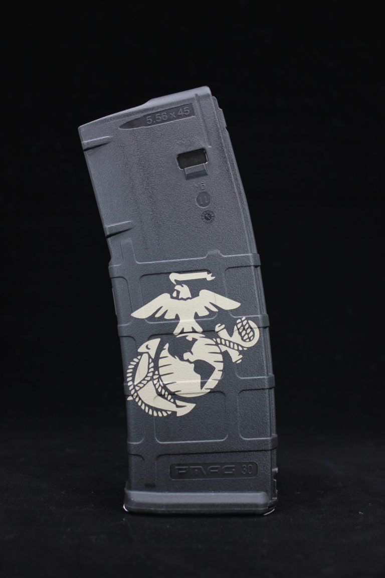 A black magazine with a picture of a marine on it.