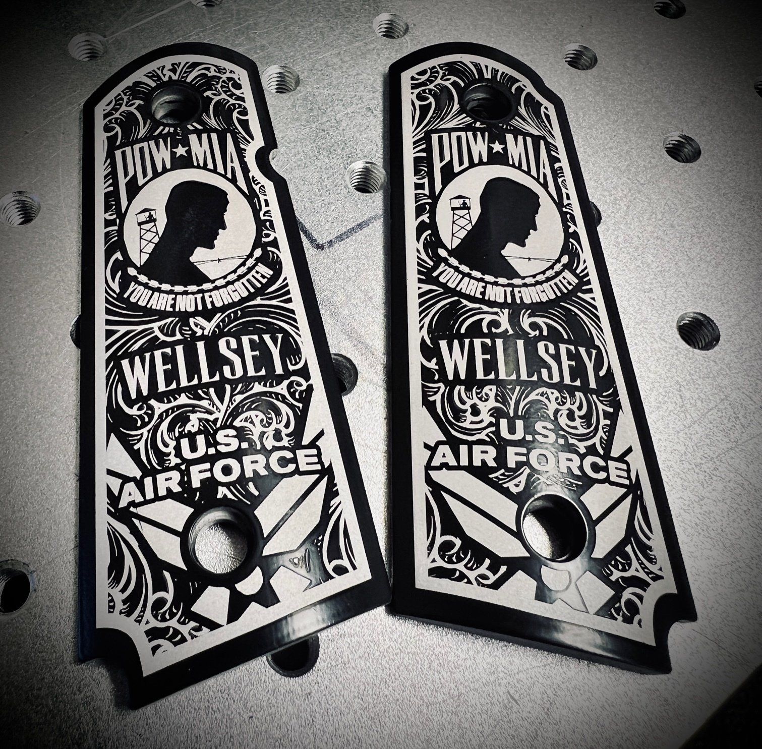 A pair of wellsey u.s. air force pistol grips