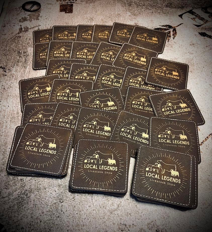 A bunch of coasters that say local legends on them