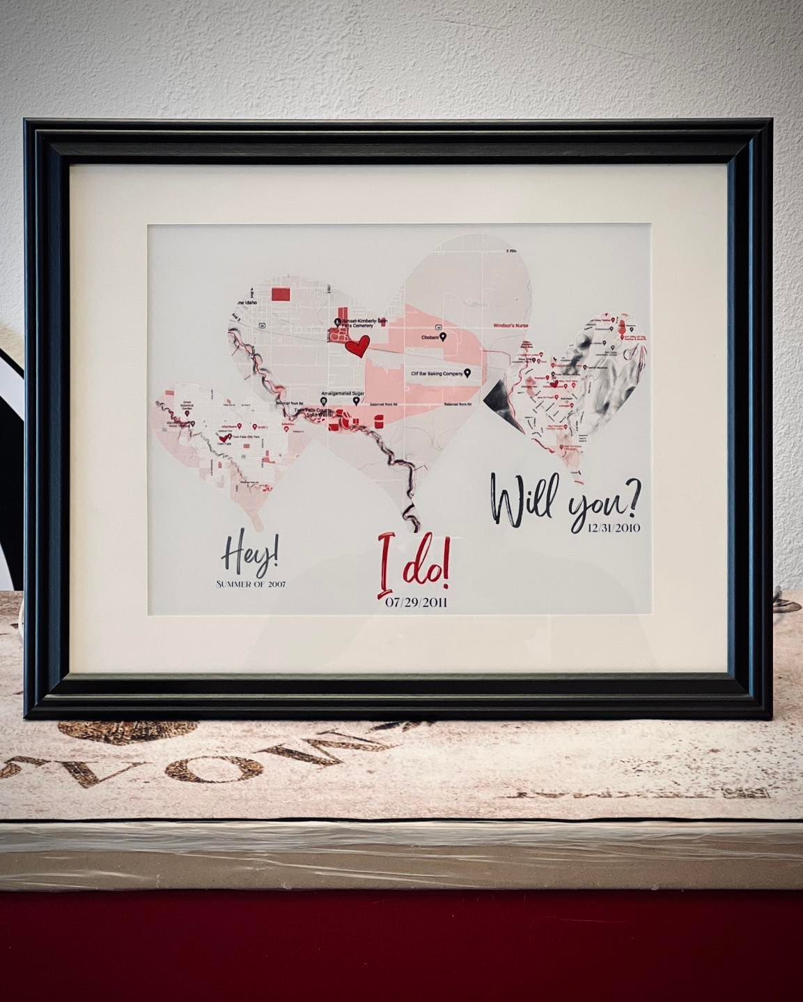 A framed picture with the words hey i do written on it