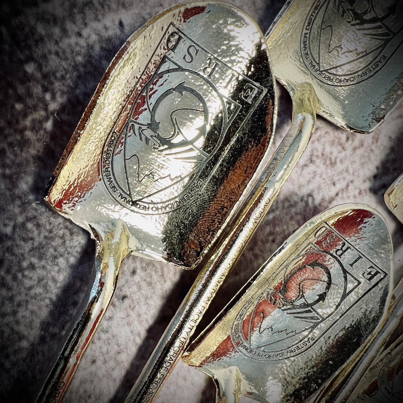 Three shovels with the word fire on them