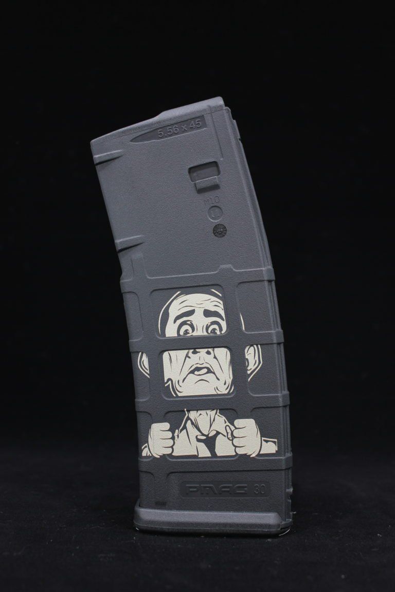 A gray magazine with a picture of a man on it.