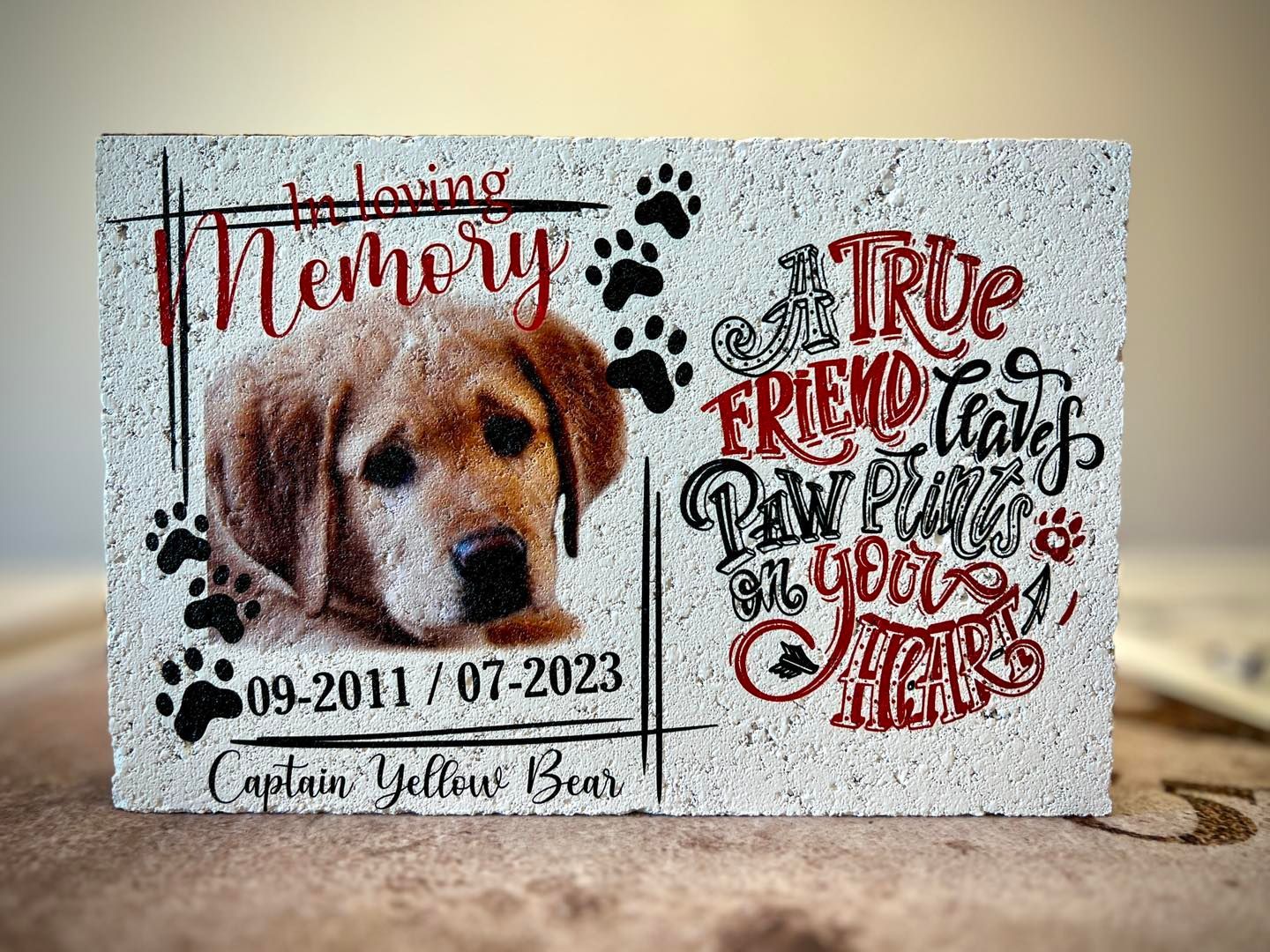 A card with a picture of a dog on it is sitting on a table.