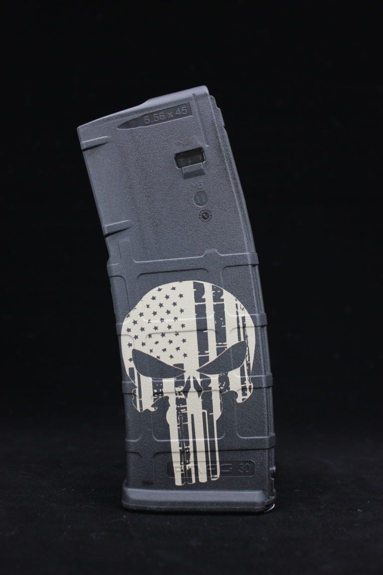 A black magazine with a punisher skull on it.