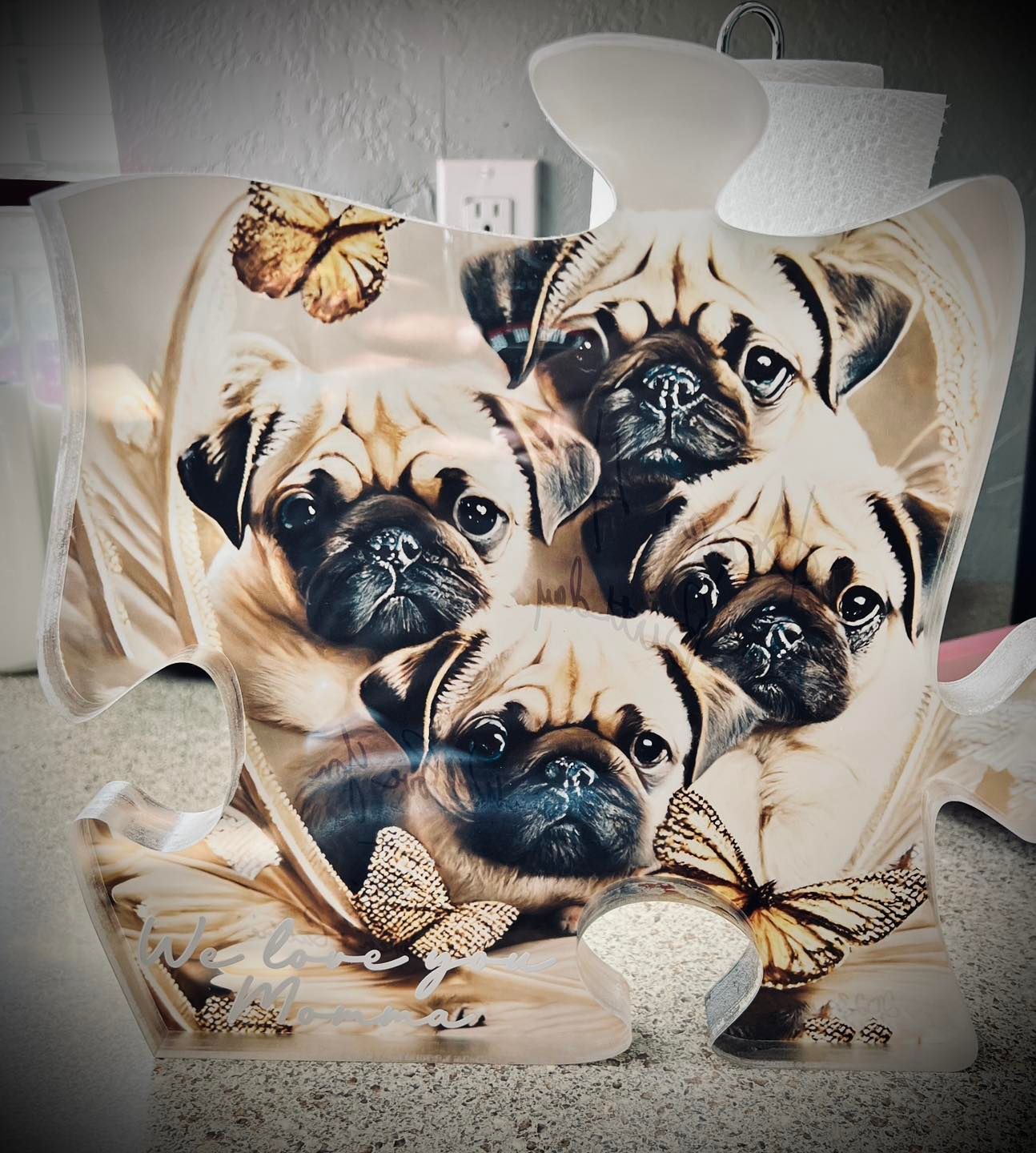 A picture of pugs and butterflies on a bag