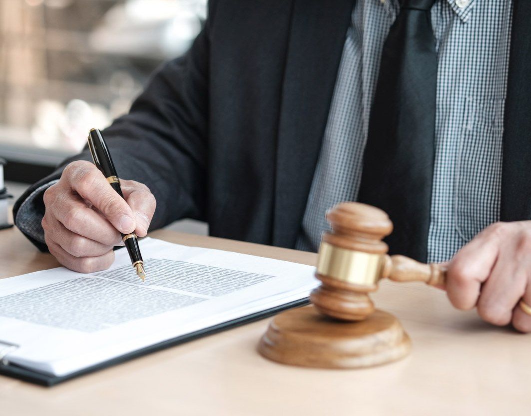 wrongful death attorney signing papers Grove City, PA