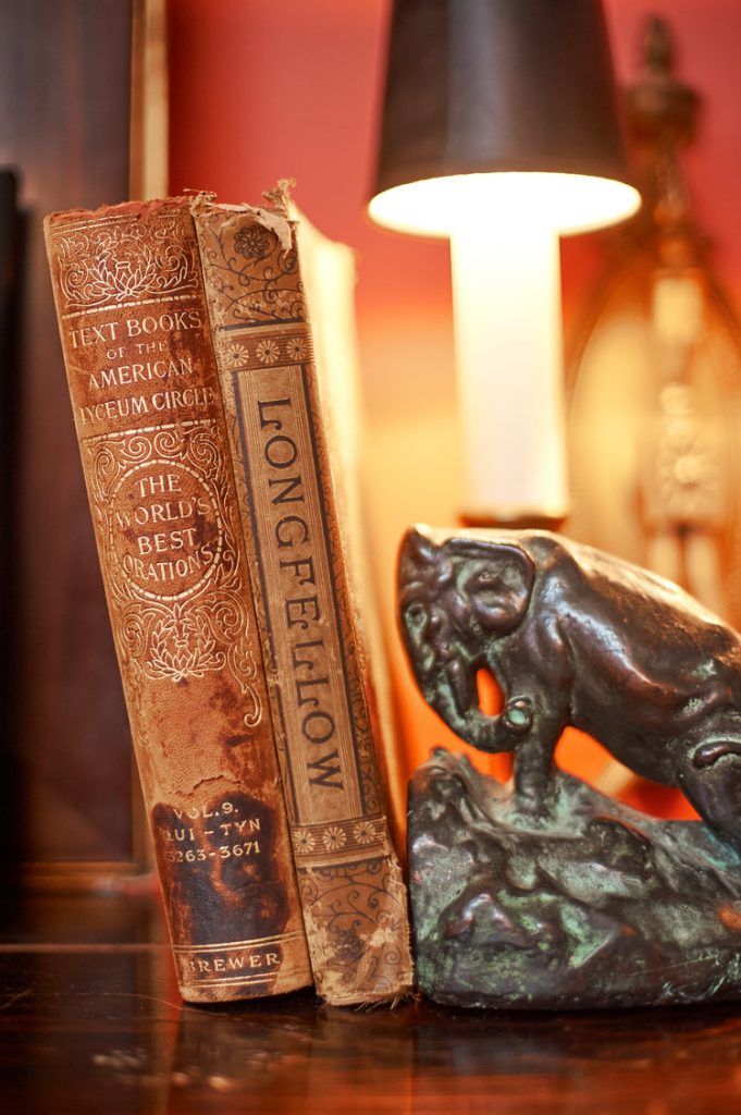 Two antique books, labeled 