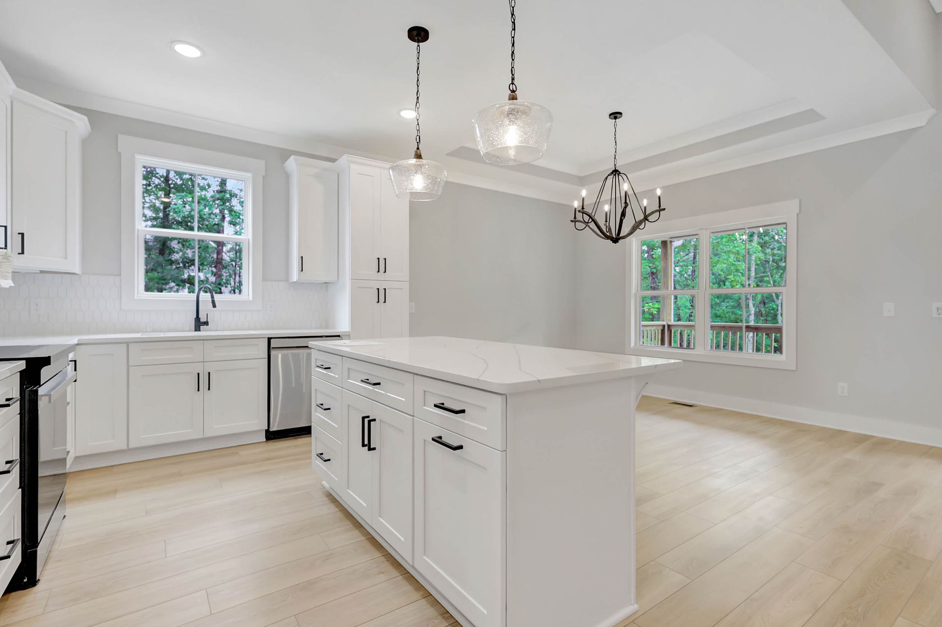 There is a large island in the middle of the kitchen.