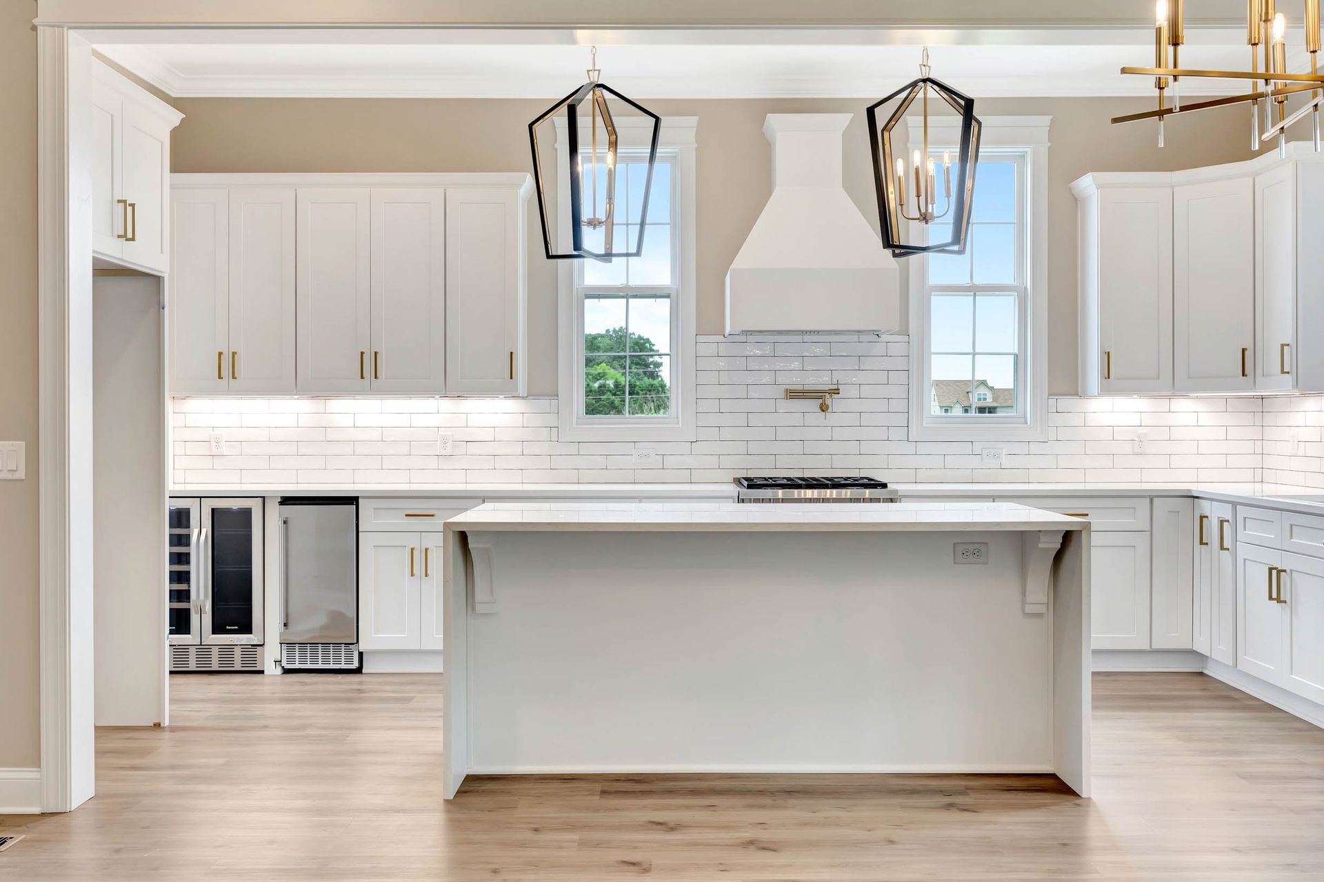 There is a large island in the middle of the kitchen.