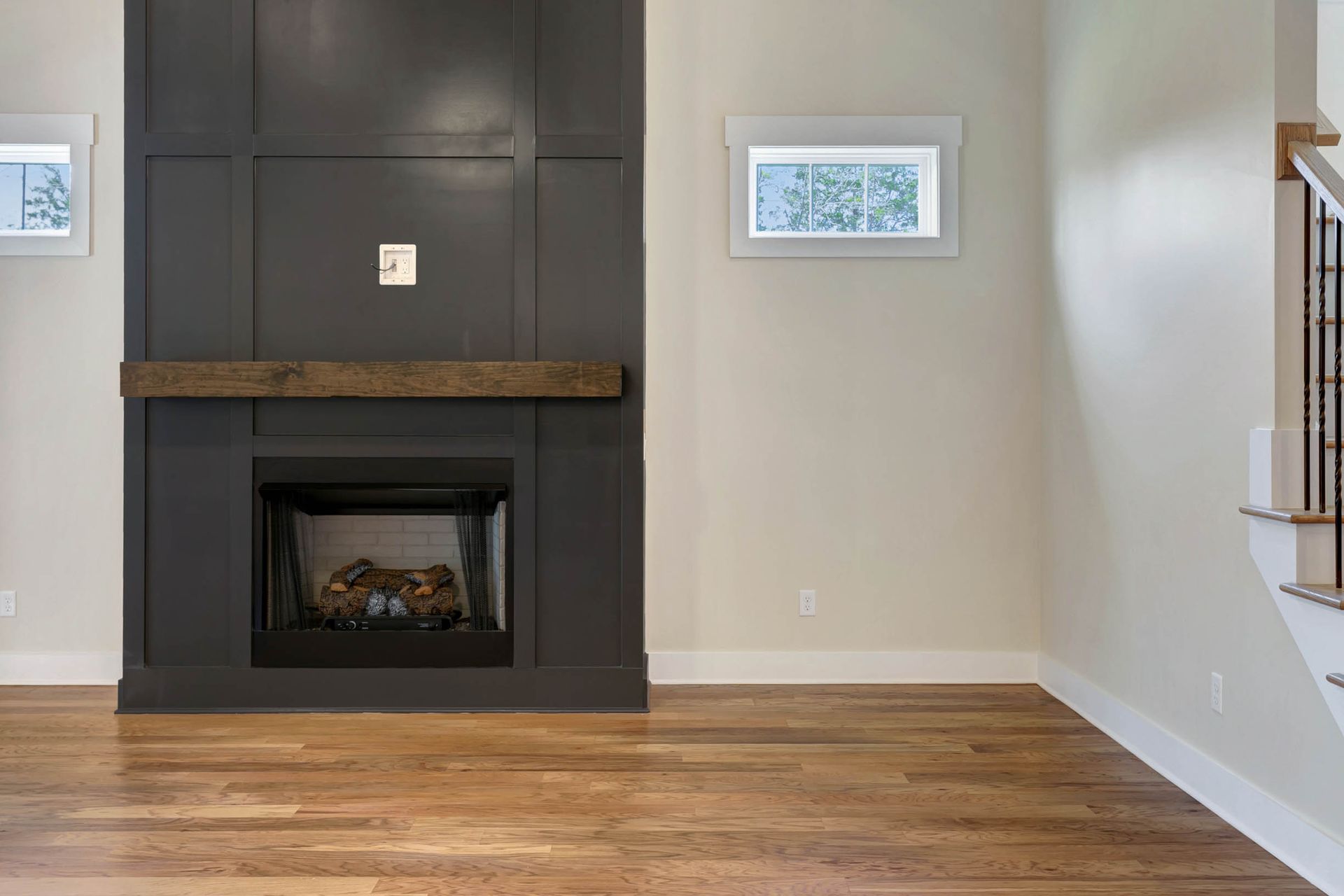 There is a fireplace in the middle of the room.