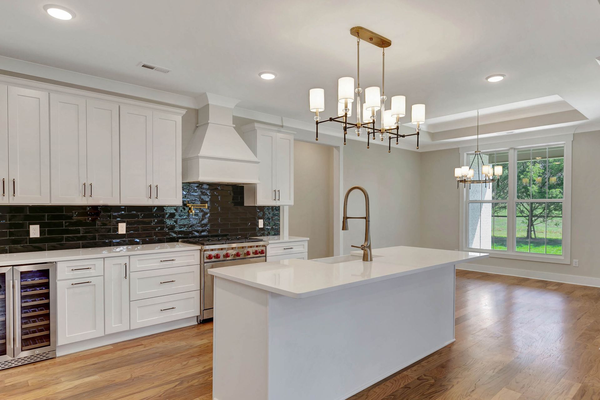 There is a large island in the middle of the kitchen.