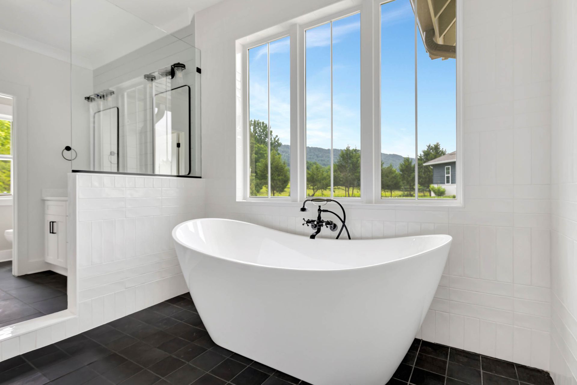 There is a bathtub in the middle of the bathroom.