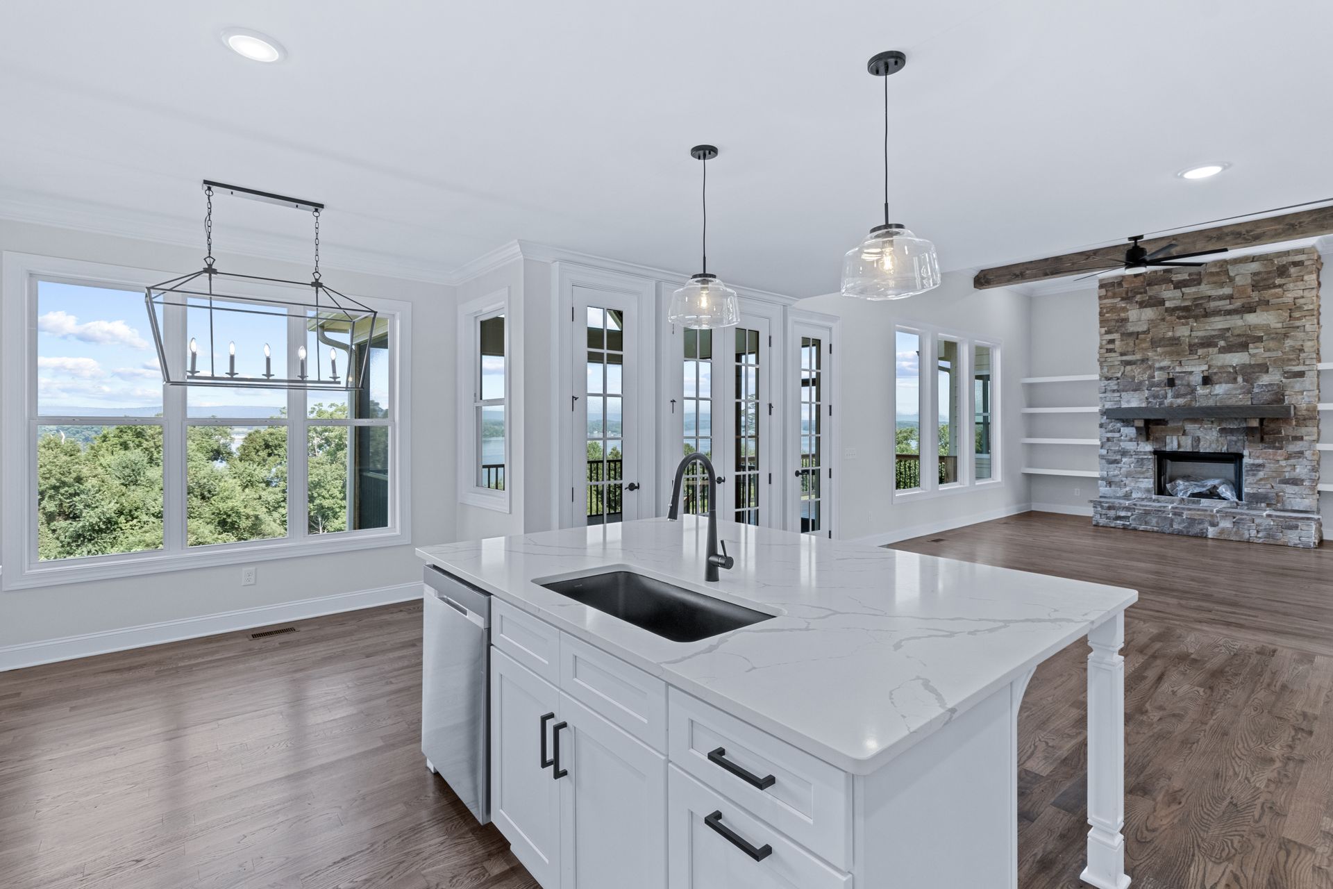 There is a large island in the middle of the kitchen.
