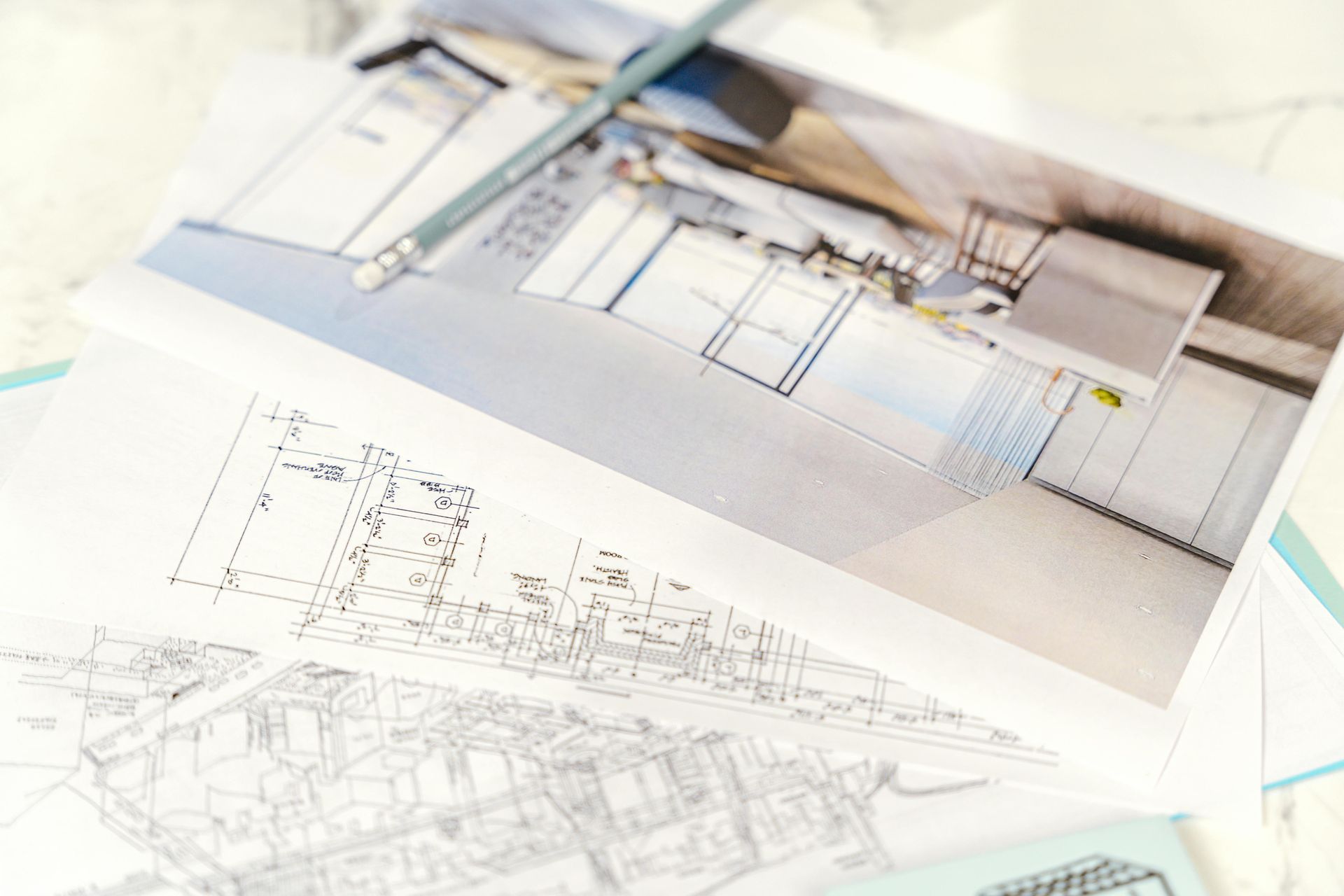 Architectural sketches and blueprint drawings spread across a desk