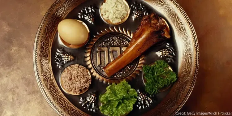 A plate of food with a hebrew symbol on it
