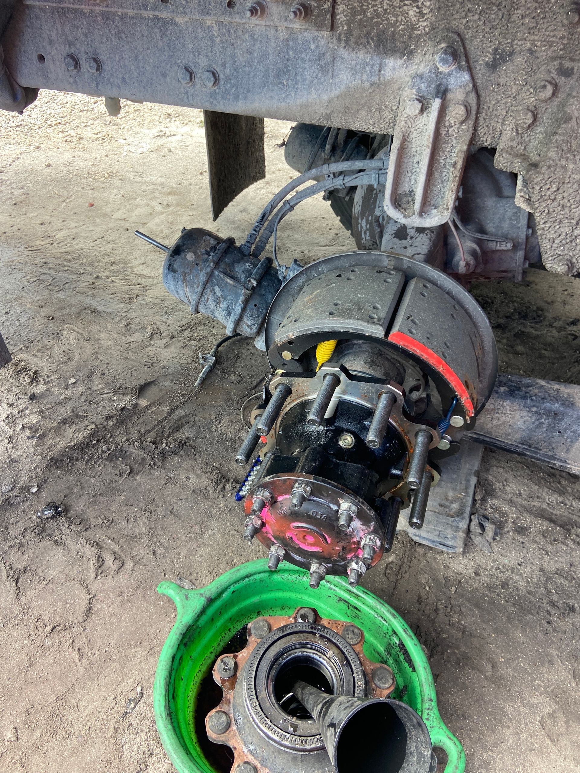 A close up of a car tire on a road.