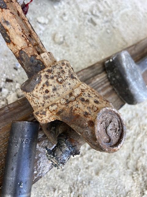 Close-up of a rusted metal part with an 