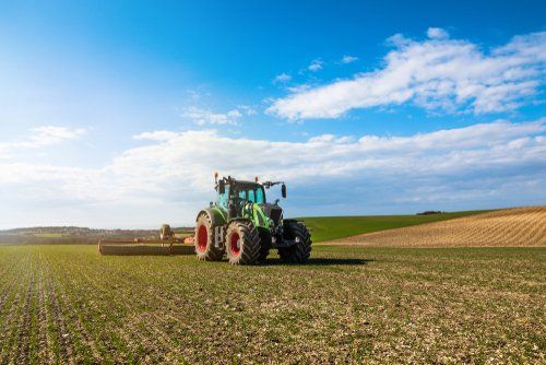 Farmer Plowing His Fields — Diesel Fitter and Mechanic In Bundaberg East, QLD