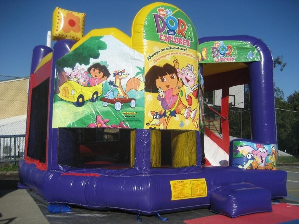 A Bouncy House With A Picture Of Dora The Explorer On It — Bills Amusements In Rockhampton, QLD