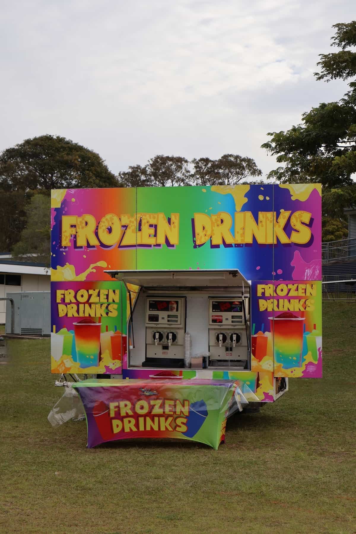 A Colourful Sign That Says Frozen Drinks On It — Bills Amusements In Rockhampton, QLD
