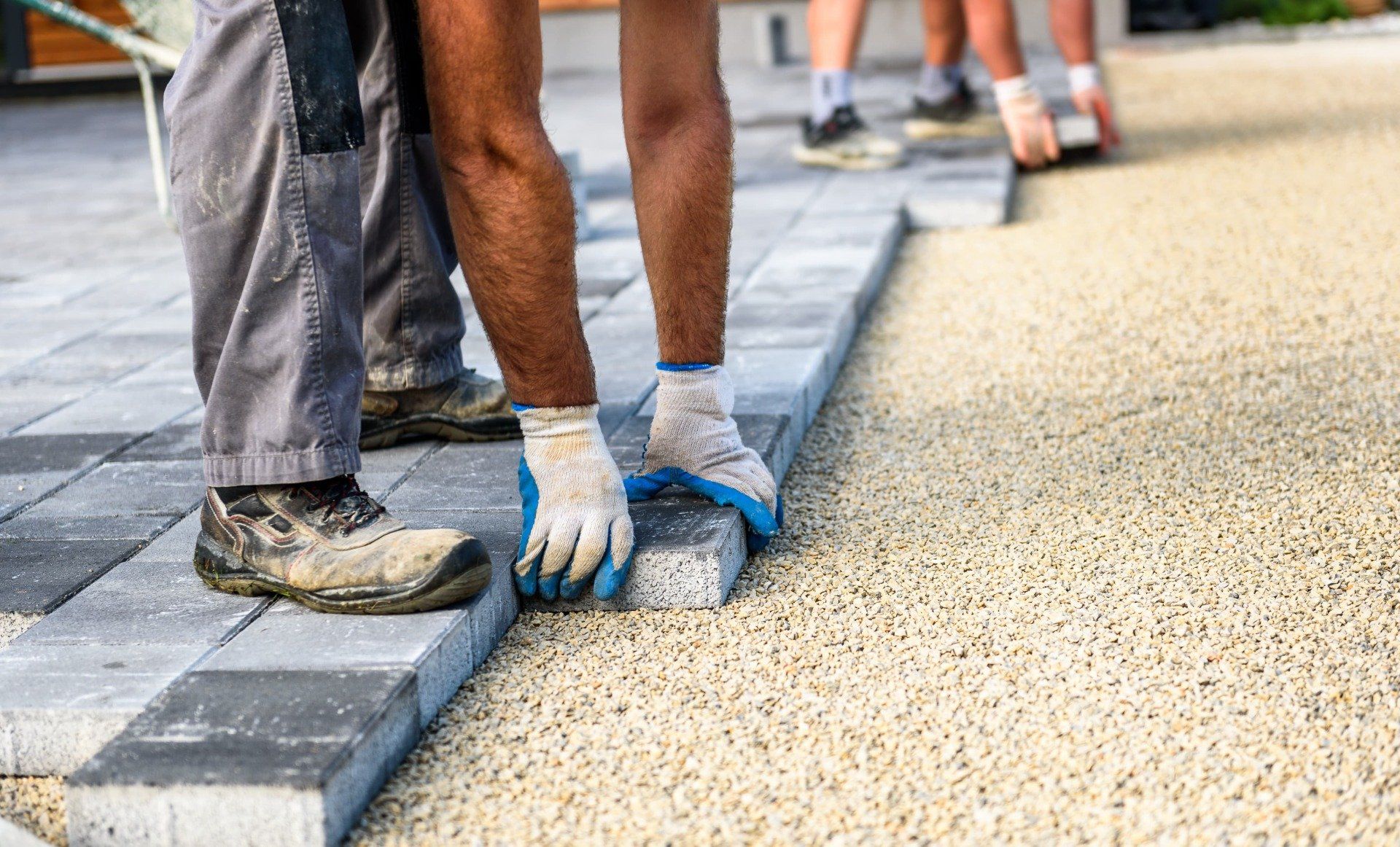 Laying Gray Concrete Paving Slabs In House Courtyard Driveway Patio