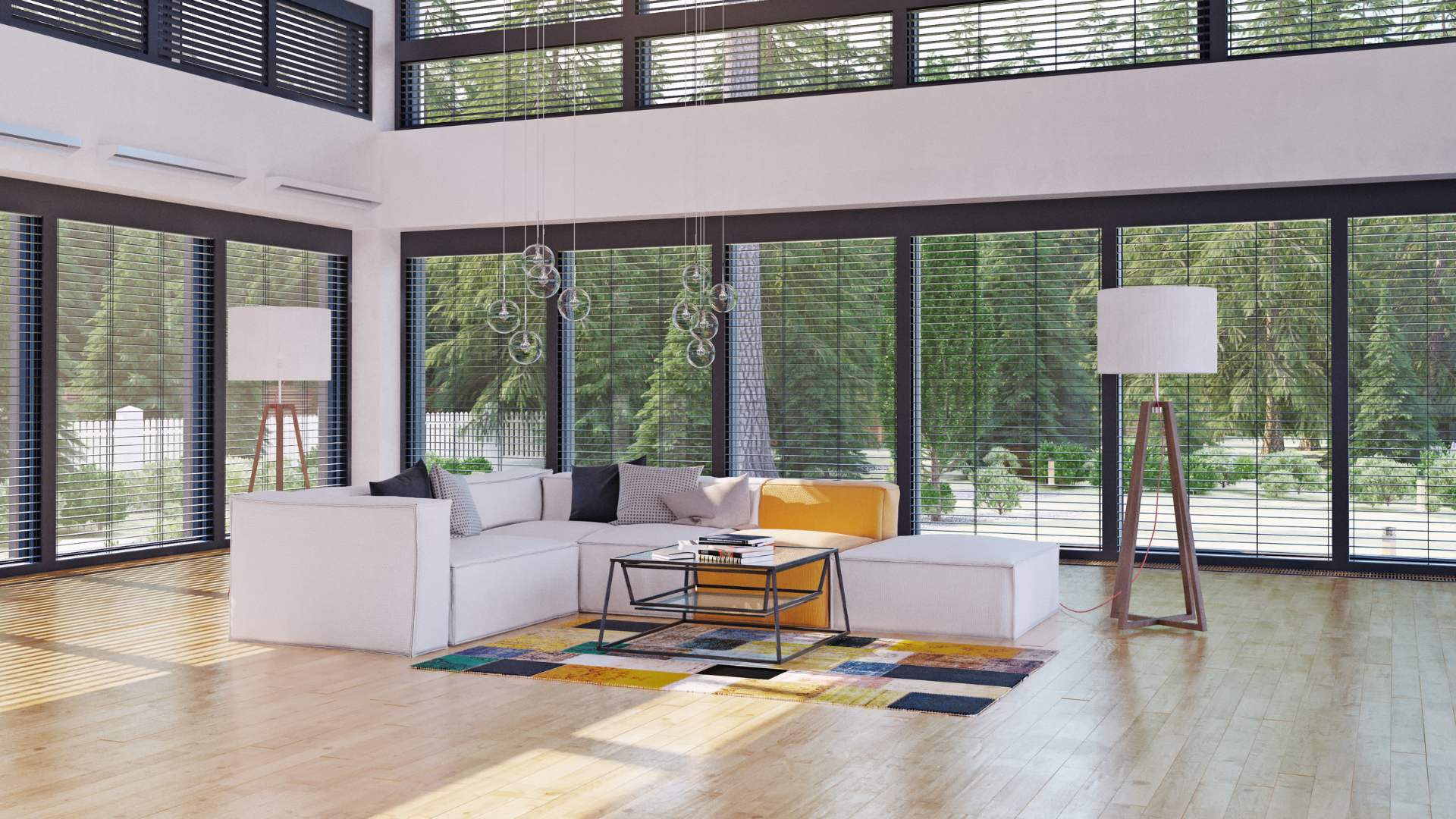 It is a living room with a lot of windows and a couch.