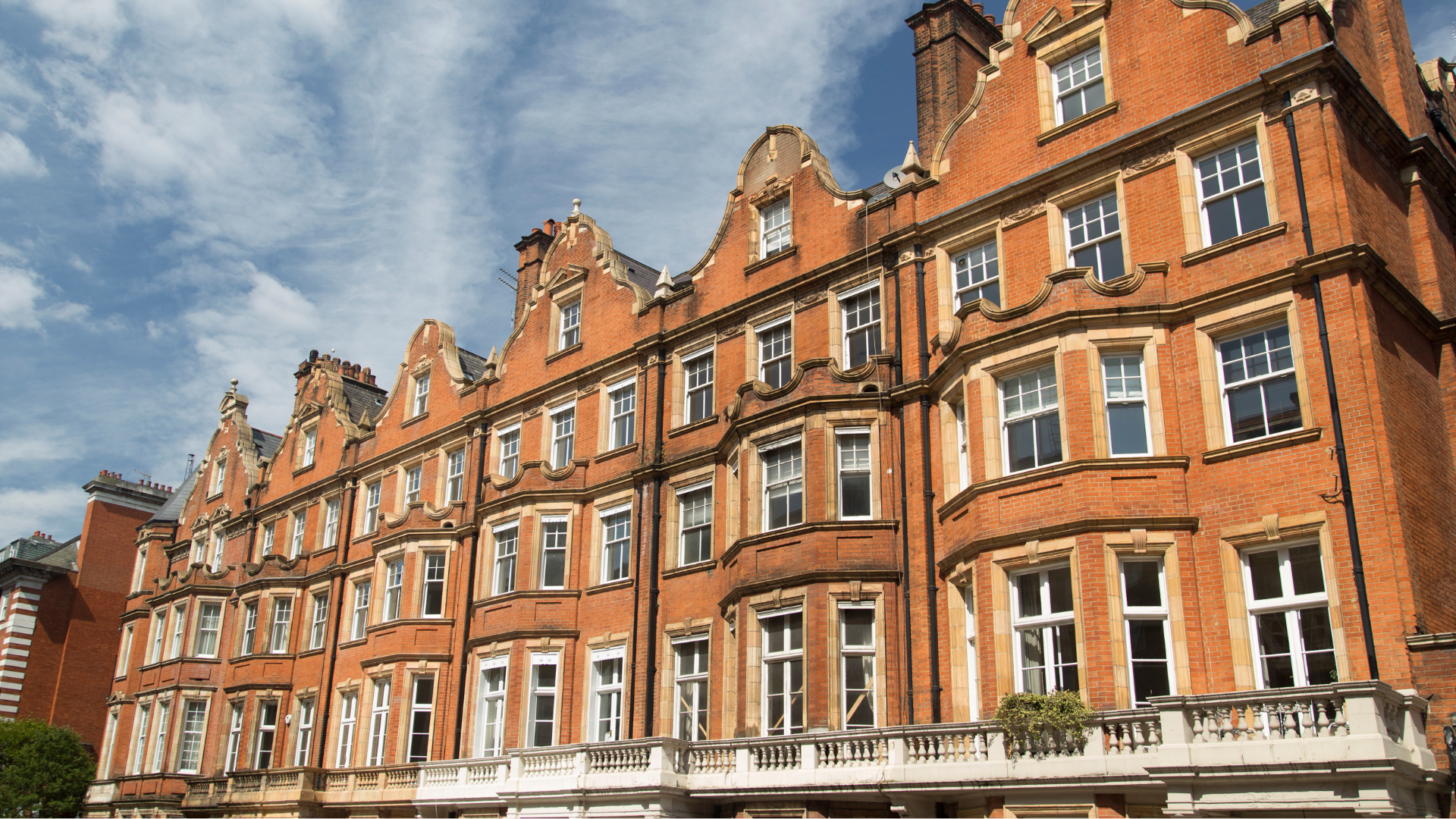 A large brick building with a lot of windows