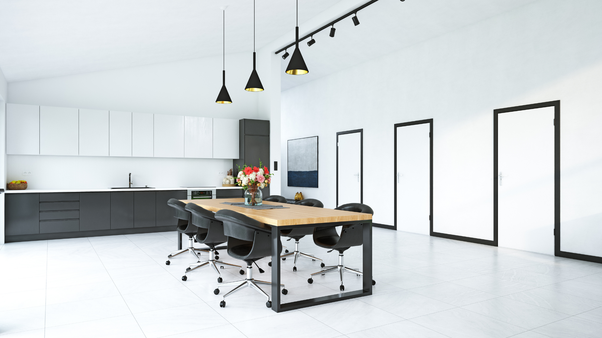 A kitchen with a dining table and chairs in it.