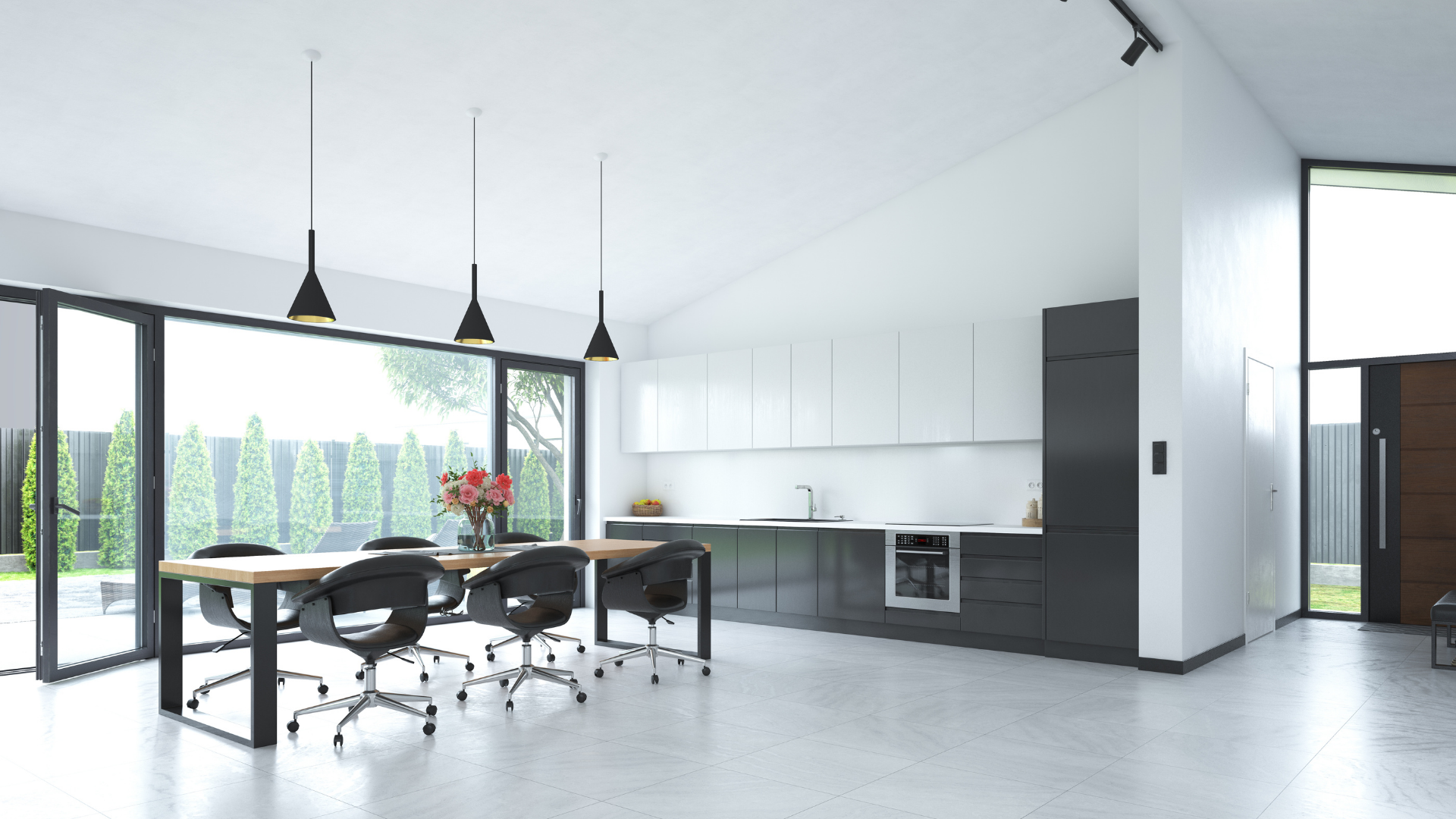 There is a dining table and chairs in the middle of the room.