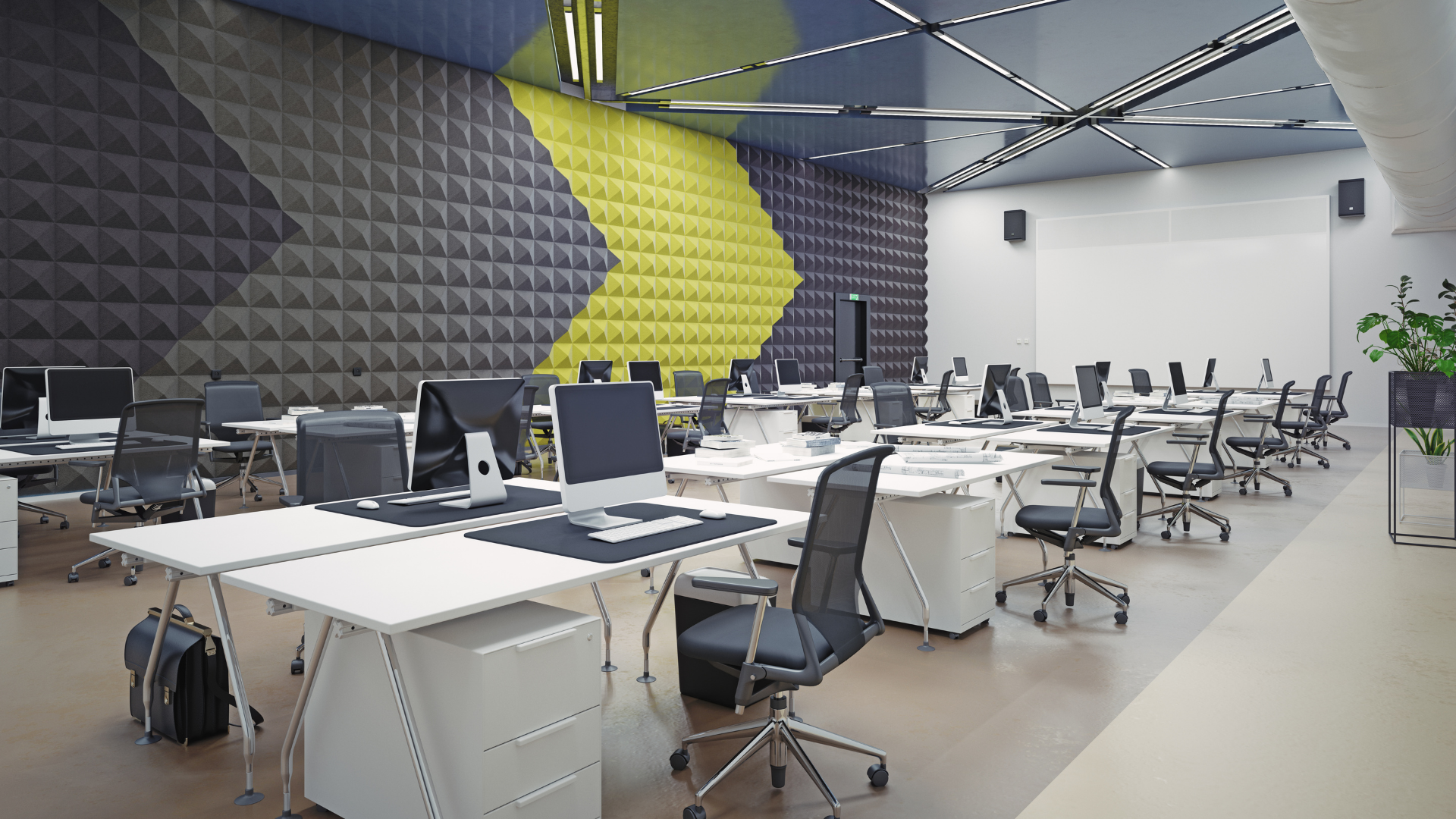 A large office with lots of desks and chairs.