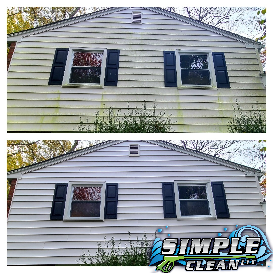 Before and after of a house's siding. The top image is dirty, the bottom is cleaned. Blue shutters and white siding.