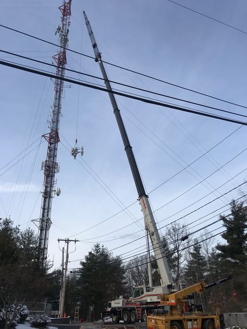 Trucks Fixing the Power Line — Dover, NH — Moores Crane Rental Corp