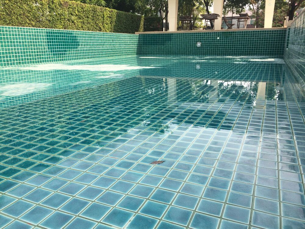 Close Up Of Aqua Tiles Of A Pool — Creative Pools and Spas in Mount Martha, VIC