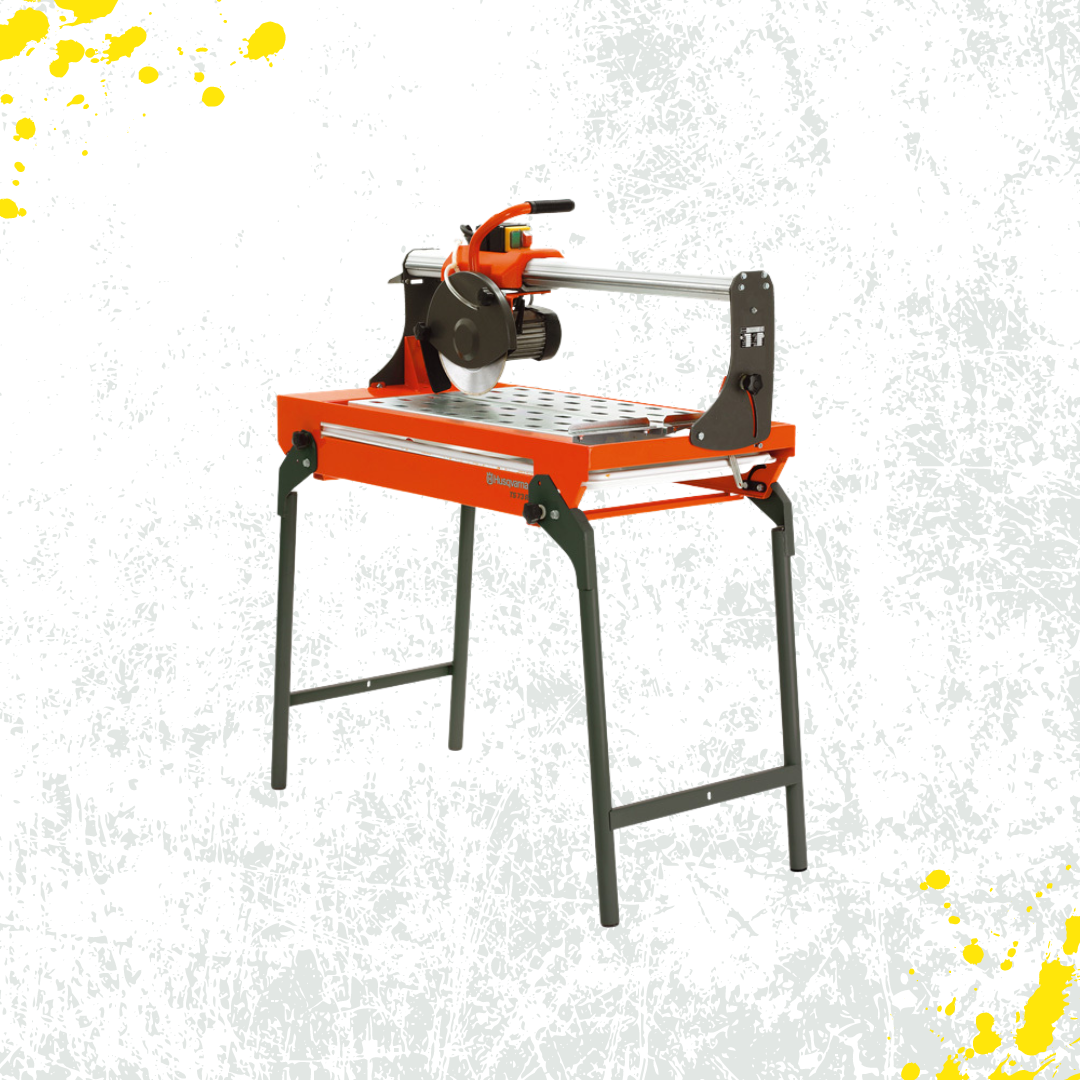 A concrete saw is sitting on top of a table on a white background.