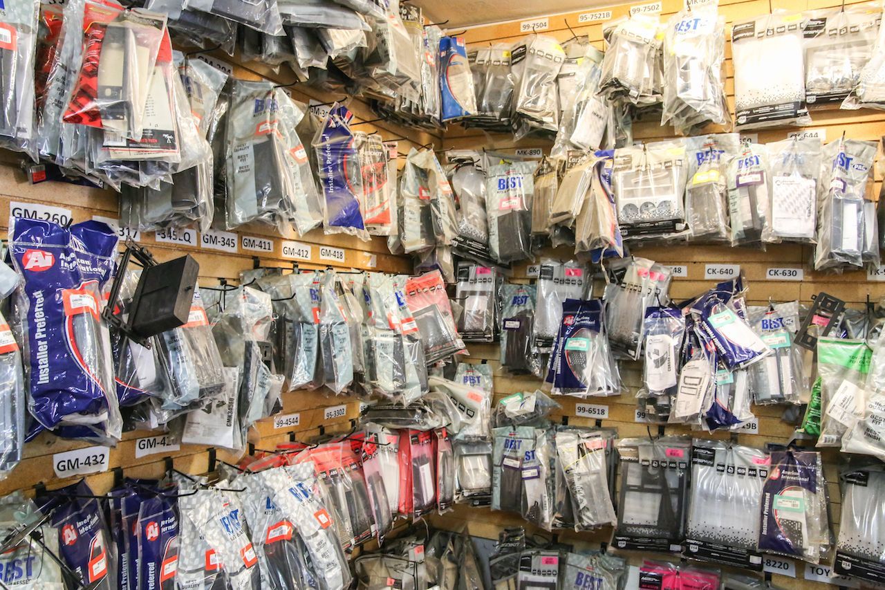 a store filled with lots of different types of electronics .