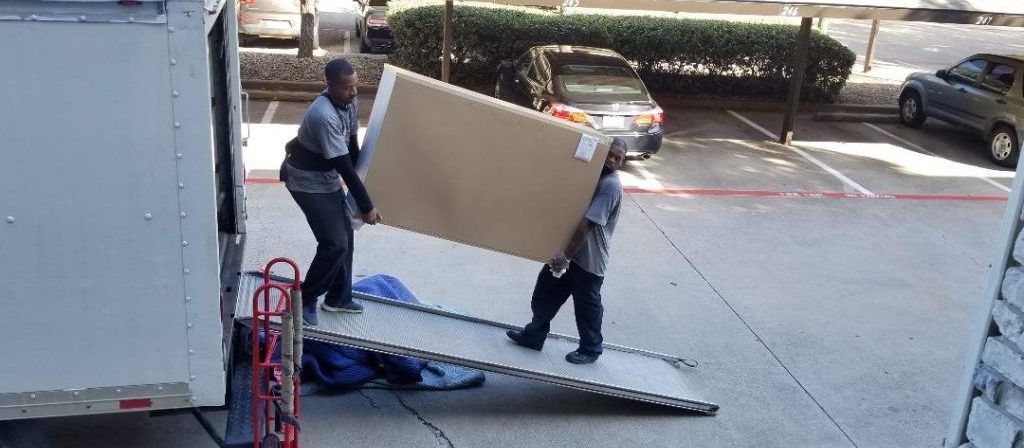 Movers Delivering Furniture on the Curb