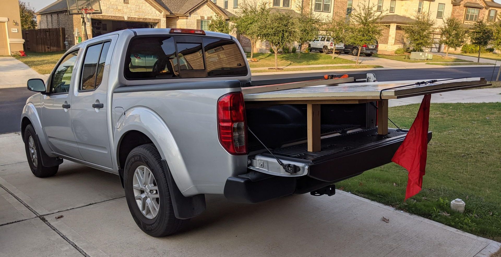 A Pick up truck delivering lumber in Canada