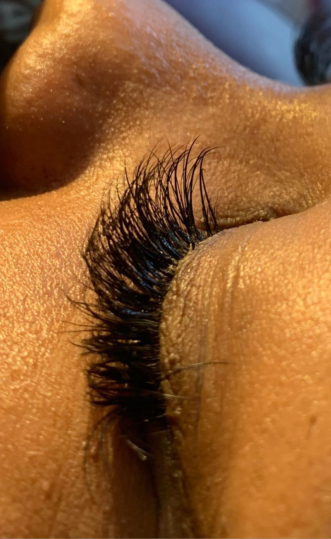 A close up of a person 's eye with long eyelashes.| St. Louis, MO | Lashing Out Loud