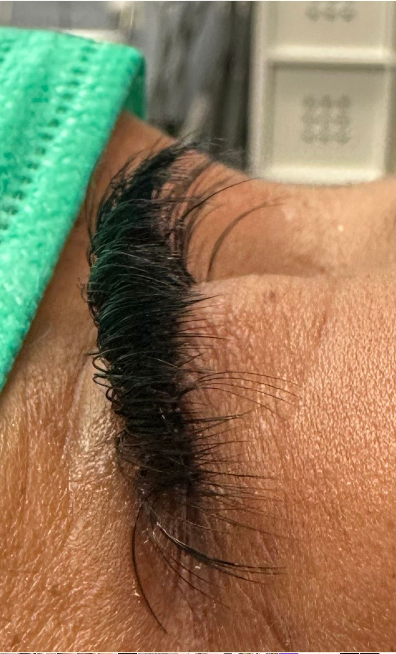 A close up of a person 's eye with long eyelashes.| St. Louis, MO | Lashing Out Loud