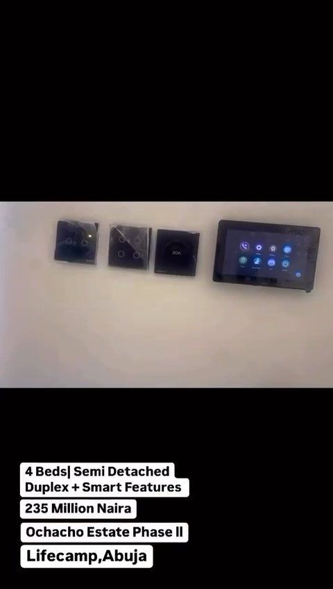 A video of a smart home with a tablet on the wall.