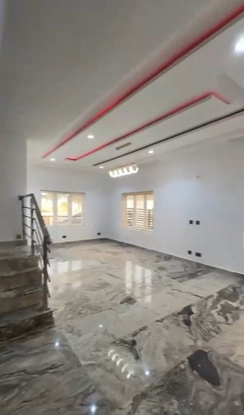 There is a staircase in the middle of the room.